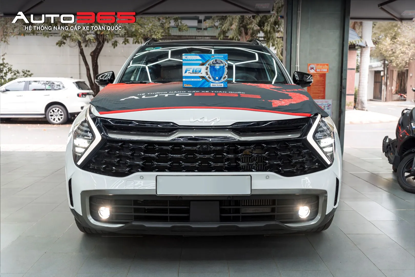 Hình 1. Kia Sportage 2.0G Premium 2022 sau khi hoàn thiện hạng mục bi gầm F10 Turbo V2 5500K tại Auto365.vn - Trụ Sở Chính.