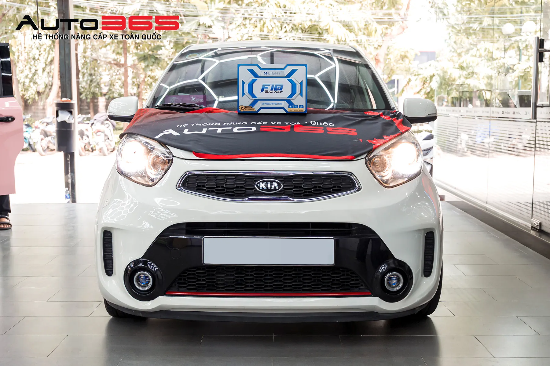 Kia Morning Si AT 2016 lắp bi gầm X-Light F10 2.0 New