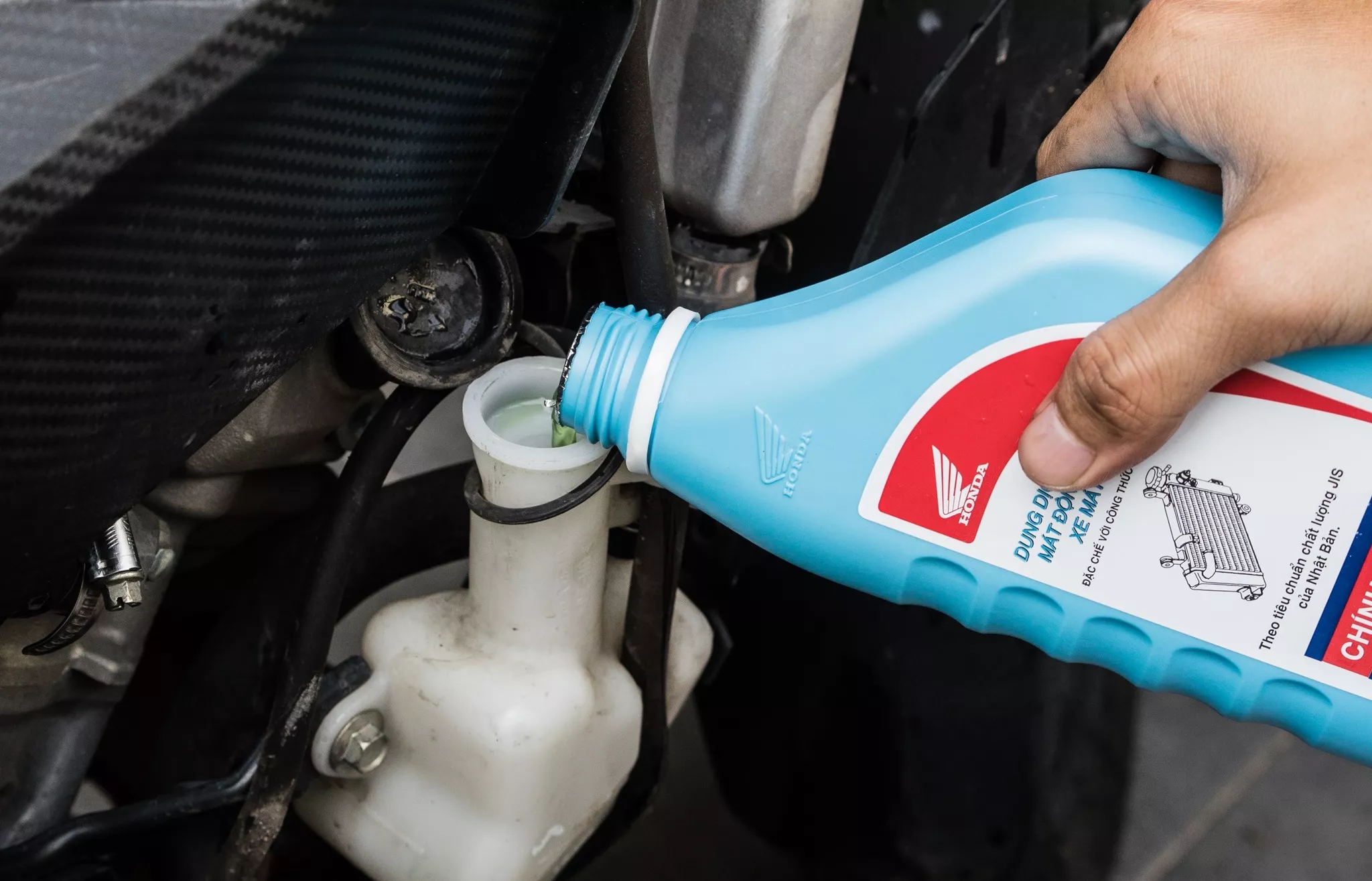NƯỚC LÀM MÁT XE MÁY 30.000 KM MỚI THAY MỘT LẦN